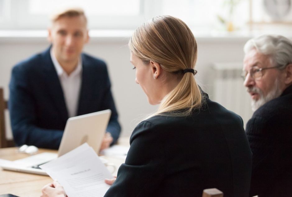 Woman in business meeting with clients